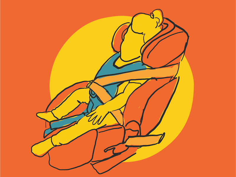 Young girl sits comfortably in her compliant child restraint, her head is well supported